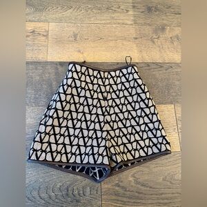 Valentino leather trimmed v logo shorts